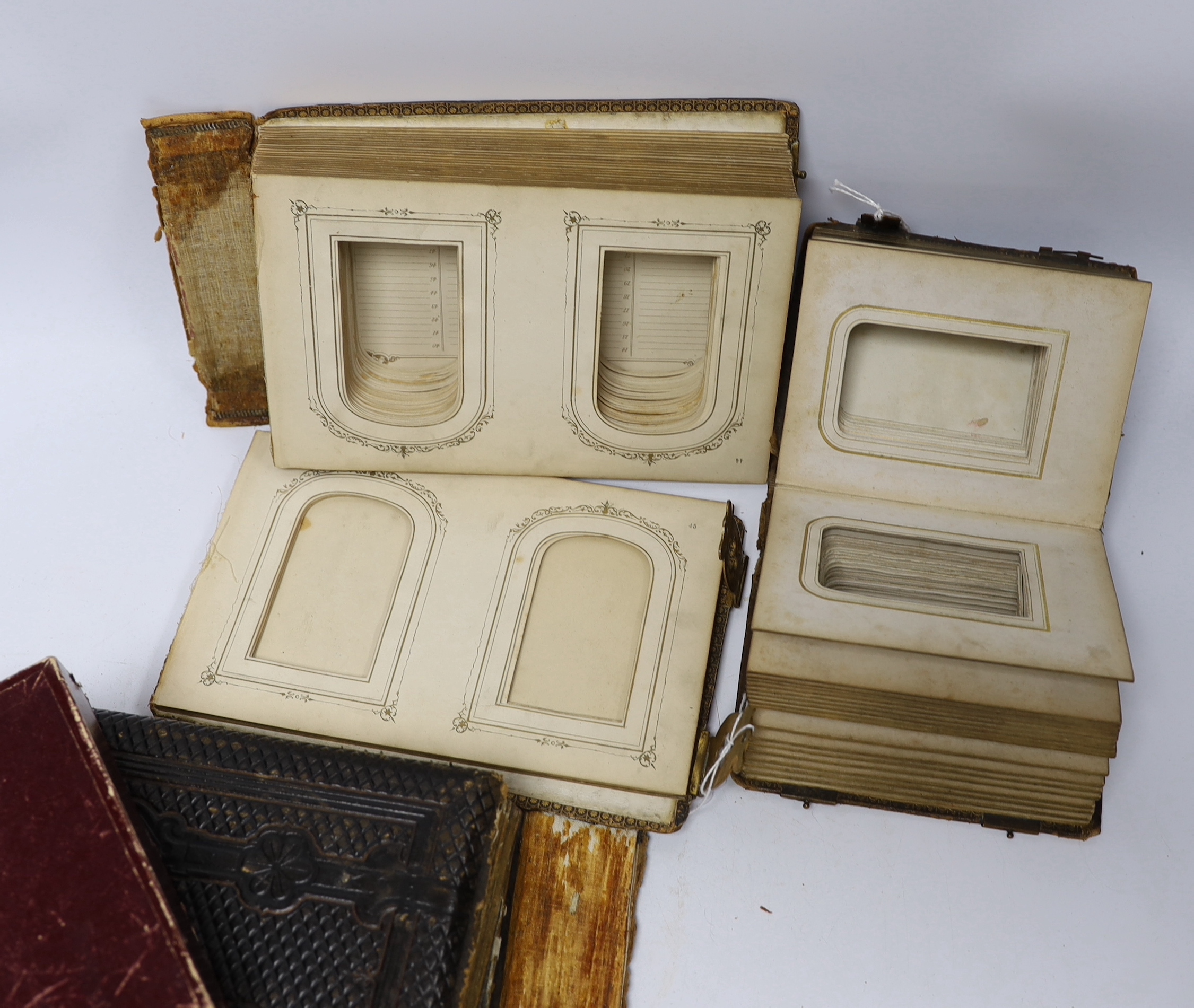 Sundry items including ephemera, empty Victorian photograph albums, bugle, miniature books, rosary and silver lidded glass pot
